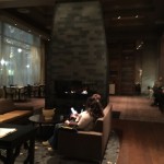 Large fireplace separates bar and first dining room