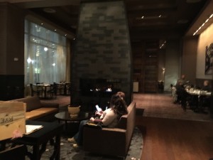 Large fireplace separates bar and first dining room