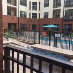 Pool at patio at The Lincoln Apartments