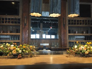 Reclaimed and industrial bar at Vita Vite art gallery + wine bar in Downtown Raleigh