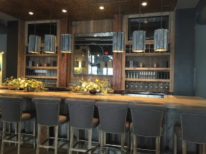 Reclaimed and industrial bar at Vita Vite art gallery + wine bar in Downtown Raleigh